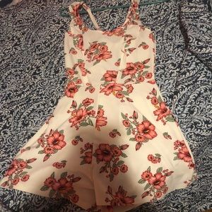 Floral White and Pink romper with a bowed back!